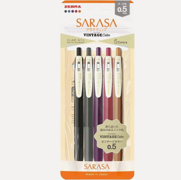 Zebra Sarasa Vintage Color 0.5 pen set in a 5-color pack, featuring five retractable gel pens in black, gray, purple, burgundy, and brown, packaged in a cardboard sleeve with Japanese text.