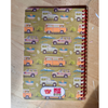 Caroline Clark Camping Trucks Pattern Notebook with colorful truck illustrations on the cover