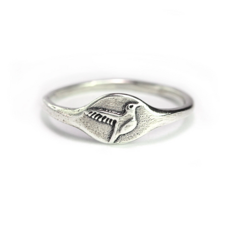 Sterling silver handmade hummingbird ring by Marmalade Jewelry featuring intricate bird design on a delicate band.