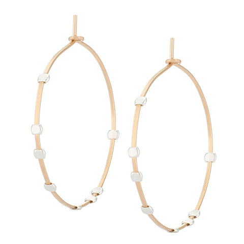 Large Minimal Cosmos Dotted Hoop earrings by Freshie & Zero, featuring a sleek hoop design with dotted accents.
