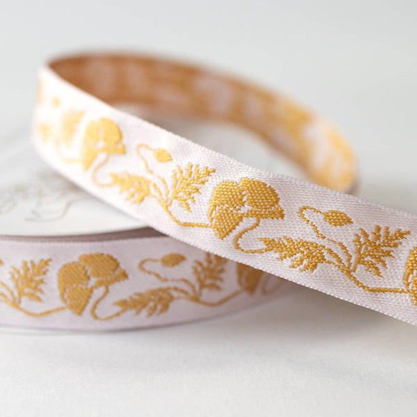 Gold Poppy embroidered ribbon, 0.75 inches wide, 5 yards long, from Botanica Paper Co., ideal for gift wrapping or craft projects.
