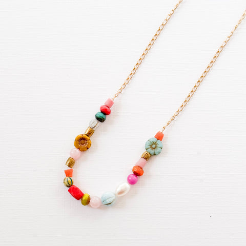 Dainty pearl flower and recycled beads necklace by Nest Pretty Things featuring a delicate floral pendant and eco-friendly beads.