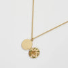 Vintage-style enamel locket necklace by Fable England featuring intricate fox and acorn design on a silver chain.