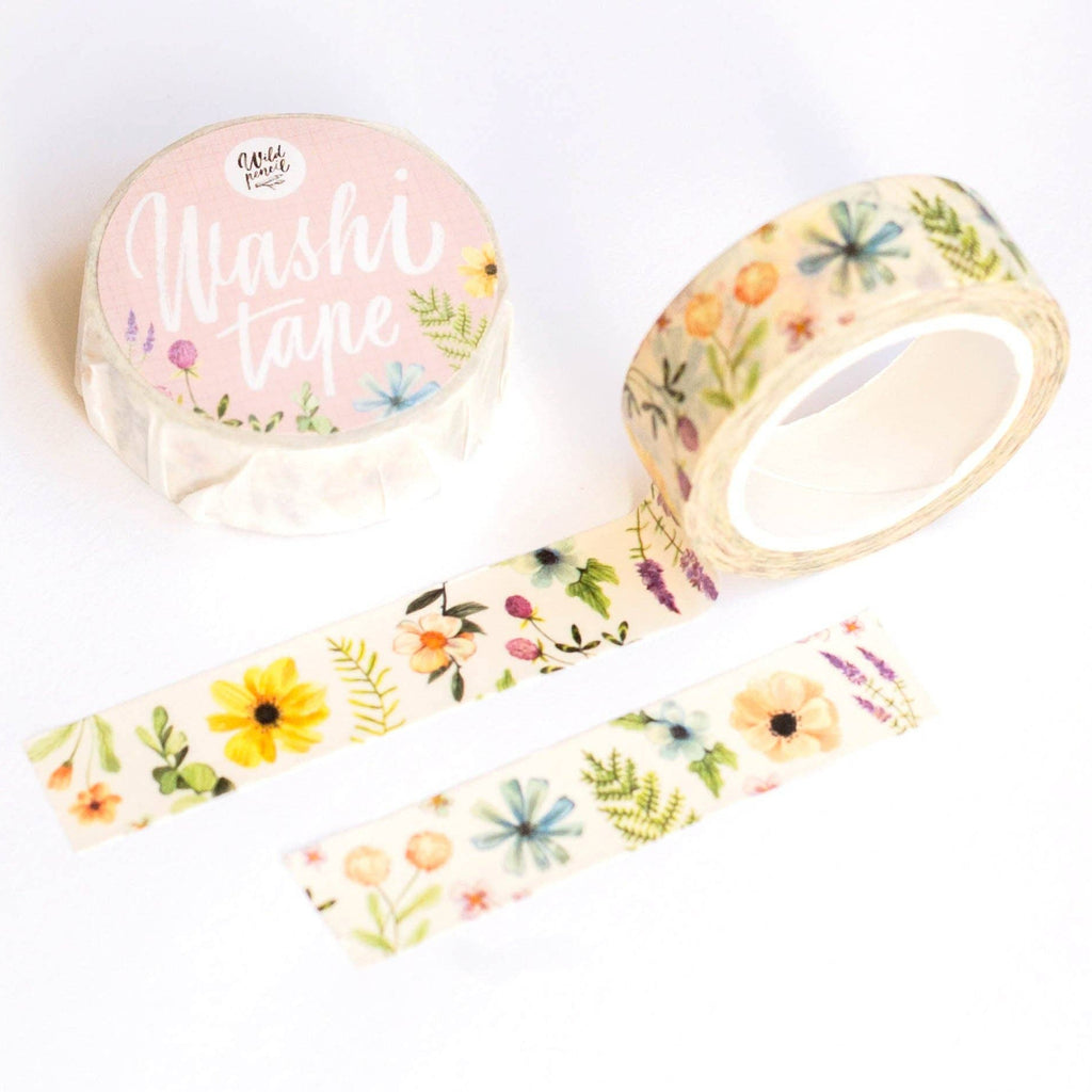 Colorful floral washi tape by Wild Pencil Studio, featuring vibrant floral patterns on a beige background for decorative crafts.