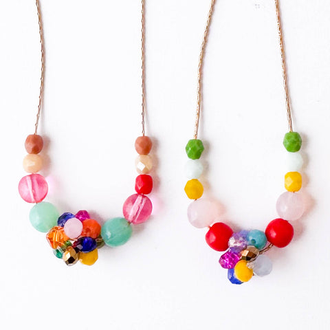 Rainbow crystal cluster beaded necklace featuring multicolored beads and a delicate chain, designed by Nest Pretty Things.