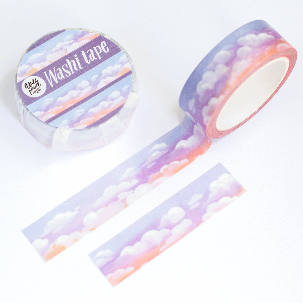 Washi tape by Wild Pencil Studio in sky blue with subtle cloud patterns, perfect for decorating and crafting projects.
