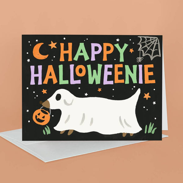 Idlewild Happy Halloweenie Halloween greeting card featuring festive Halloween-themed illustrations and cheerful message inside.