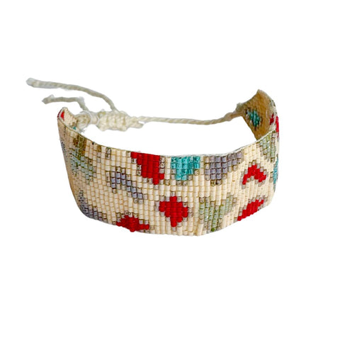Beaded cream leopard bracelet by Powder Design featuring stylish beaded jewelry with cream and leopard print accents.