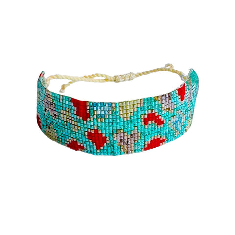 Beaded Aqua Leopard bracelet by Powder Design featuring colorful powder beads and a stylish leopard pattern.