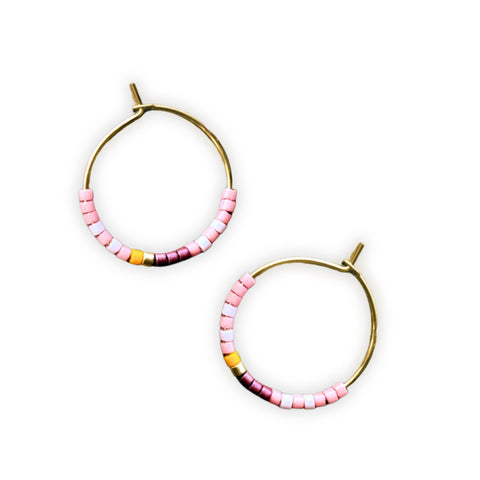 Small desert beaded hoop earrings by Ocean Breakup featuring colorful beaded details and silver hoops.