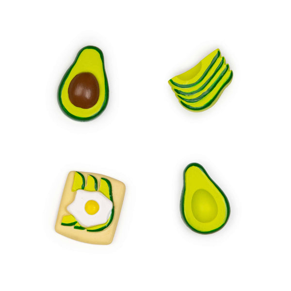 Set of four Avocado Mighties® magnets from Three by Three Seattle, featuring playful avocado designs on a home accessory.