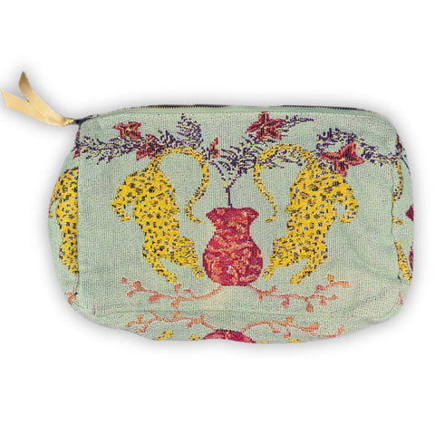 Large metallic fabric makeup bag with a cheetah print from Saint Austin Company, stylish storage for cosmetics and accessories.