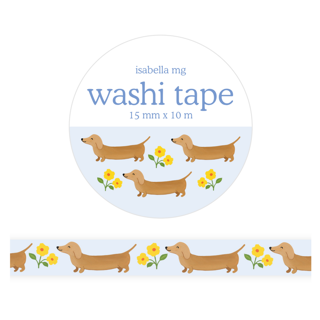 A roll of washi tape with a repeating pattern of brown dachshunds and yellow flowers, shown with the brand label 'isabella mg' and product details on a white background.