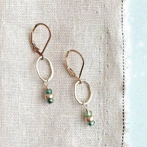 Tidal green gemstone drop earrings by Freshie & Zero featuring vibrant green stones and elegant silver hooks.