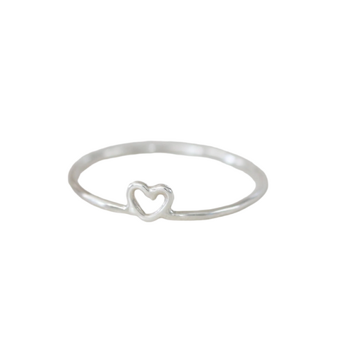 Stacking heart-shaped rings by Christina Kober, featuring multiple delicate gold rings with heart motifs, on a white background.