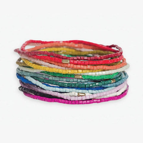 Stack of 18 Ink + Alloy Chelsea Luxe Rainbow Beaded Bracelets featuring colorful beads and adjustable cords for a stylish look.