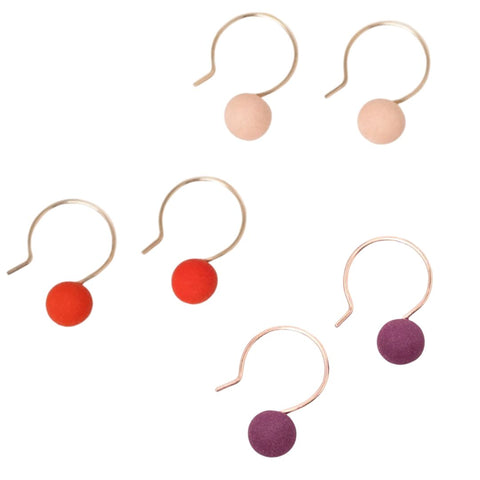 Dapple Dot Earrings by Twenty Two West featuring colorful circular design and gold-plated hooks, close-up of stylish jewelry.