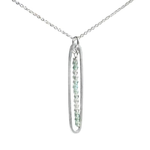 Lyric necklace by Freshie & Zero featuring a pale green prehnite pendant on a delicate chain, stylish and elegant jewelry piece.