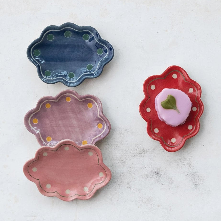 Cream-colored stoneware scalloped trinket dish by Creative Co-Op, featuring a decorative, vintage-inspired design for jewelry or small items.