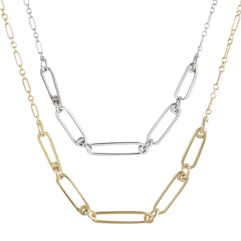 Mini Reef Links Necklace by Freshie & Zero featuring delicate silver reef-shaped links on a thin chain.