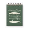 Green notebook with white fish illustrations on a white background