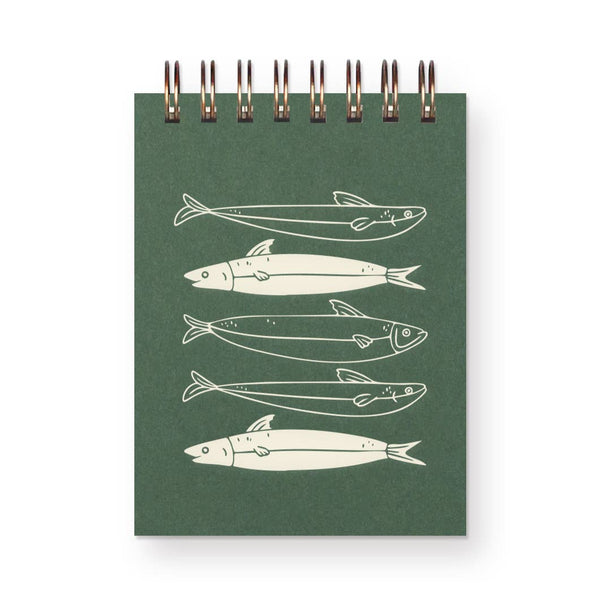 Green notebook with white fish illustrations on a white background