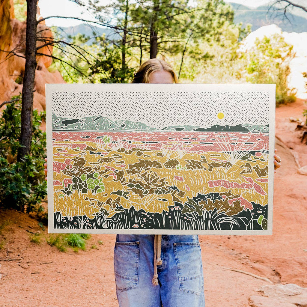 Caroline Clark New Mexico desert landscape art print featuring warm desert scenery and an expansive sky