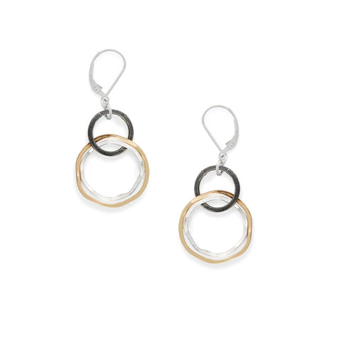Mixed radiate earrings by Freshie & Zero featuring unique, radiant designs with a mix of shapes and textures in silver tones.
