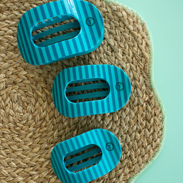Large flat round TELETIES Summertime hair clip in vibrant colors, designed for securing hair with a stylish, functional accessory.