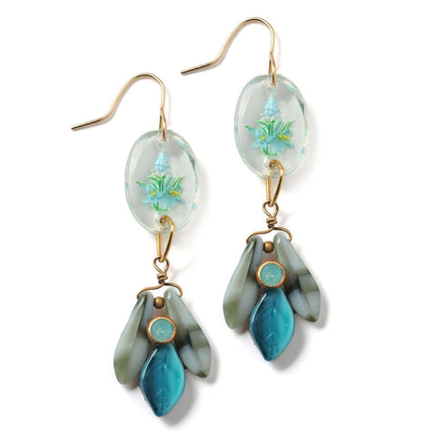 Cornflower blue dangle earrings by Jill Schwartz, featuring elegant metal hooks and intricate floral-inspired design.