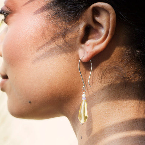 Butter yellow Medina Drop Earrings by Freshie & Zero, stylish gold-tone earrings with a sleek drop design.