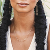 Mini Reef Links Necklace by Freshie & Zero featuring a delicate chain with miniature reef charms, perfect for beach-inspired jewelry.
