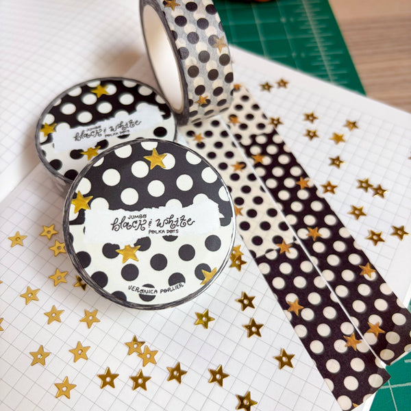 Black and white polka dot washi tape by Veronica Porlier Illustrations, featuring a playful dotted pattern on paper tape.