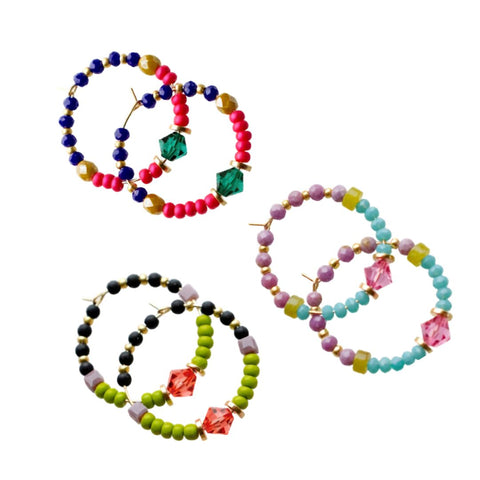 Colorful small beaded Veda hoop earrings by Jill Makes, featuring vibrant multicolored beads and classic hoop design.
