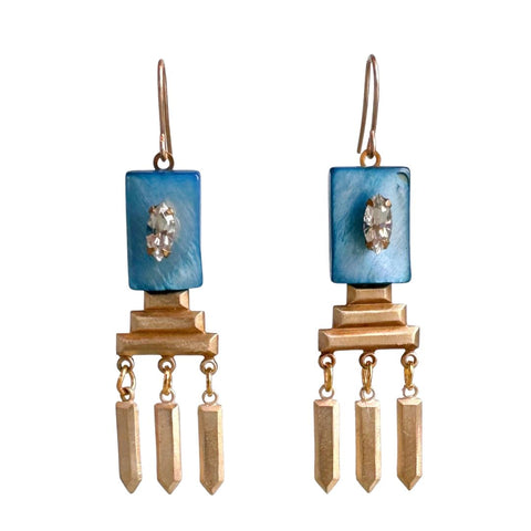 A pair of geometric earrings by Elements Jill Schwartz featuring modern, angular design in silver-tone metal.