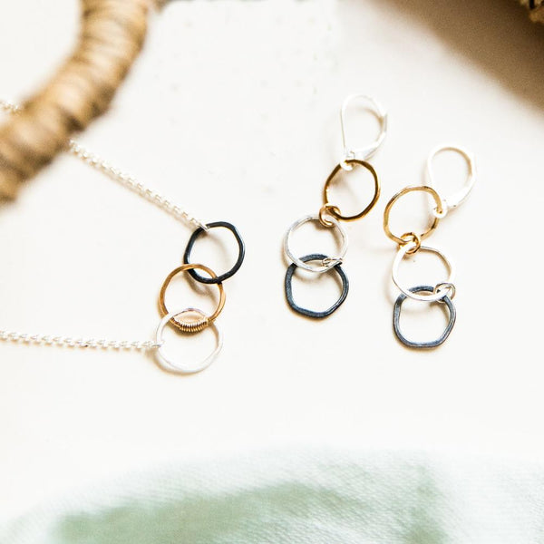 gold silver black linked hammered circles earrings