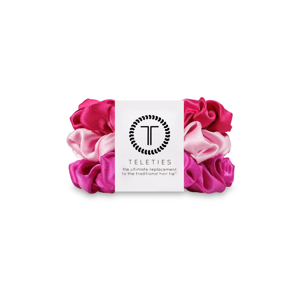 Set of three TELETIES small silk scrunchies in rose color, soft hair accessories for gentle hold and stylish hair styling.