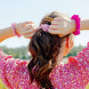 Set of three small TELETIES silk hair scrunchies in soft rose color, perfect for gentle, stylish hair accessories.