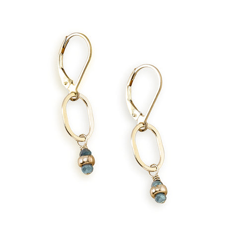 Tidal blue gemstone drop earrings by Freshie & Zero featuring sparkling blue gemstones and elegant dangle design.