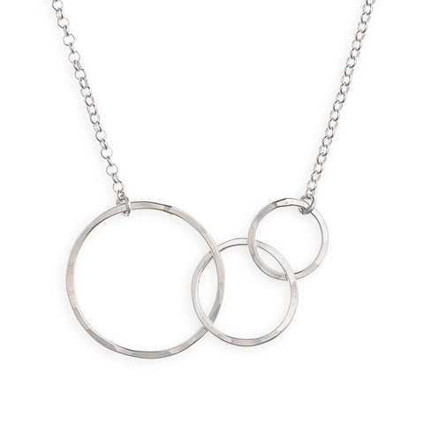 Many Moons necklace by Freshie & Zero featuring a celestial design with multiple moon charms on a delicate chain.