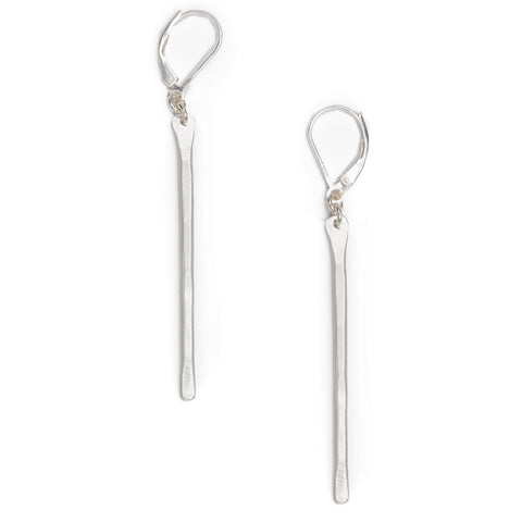 Freshie & Zero stem earrings featuring sleek, minimalist design with silver-toned metal and modern geometric shape.