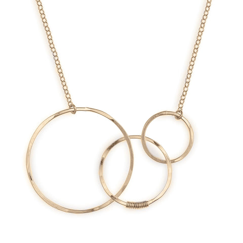 Large Many Moons necklace by Freshie & Zero featuring a celestial pendant with multiple moon shapes on a delicate chain.