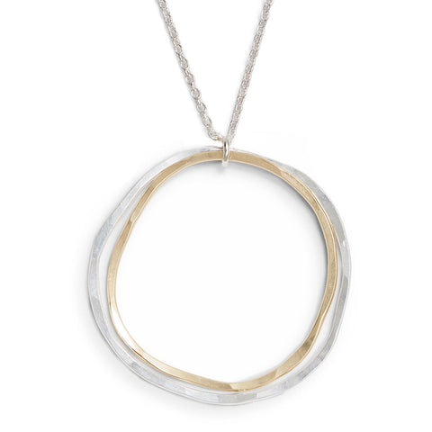 Freshie & Zero Caldera Necklace featuring a delicate pendant on a silver chain, displayed against a neutral background.