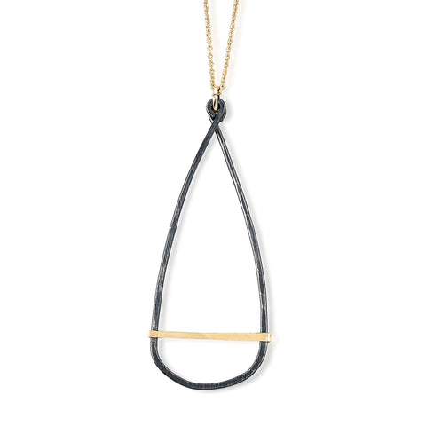 Antique oar necklace by Freshie & Zero featuring a vintage-style metal oar pendant on a chain.