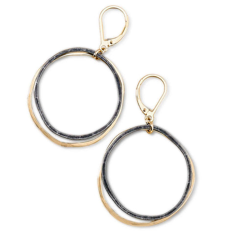 Antique caldera earrings by Freshie & Zero featuring intricate metalwork and vintage-inspired design on a plain background.