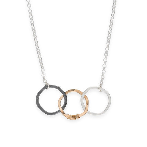 Freshie & Zero Ramble Necklace, life's journey pendant on a delicate chain, close-up of the stylish jewelry piece.