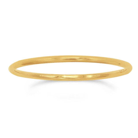 Thin gold filled stacking ring with a smooth finish, designed for layered jewelry styles.
