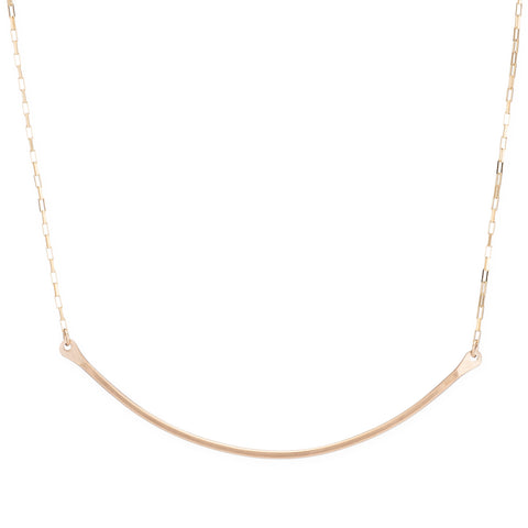 Gold Horizon necklace by Freshie & Zero featuring a sleek, minimalist design with a delicate chain and horizon pendant.