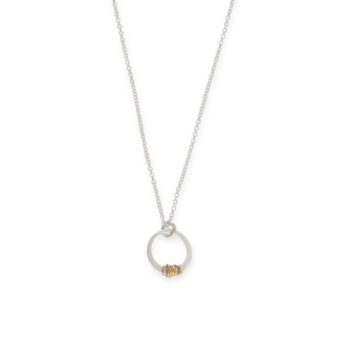 Mini Sparky Stitch necklace by Freshie & Zero featuring a delicate, handcrafted stitch design on a dainty chain.