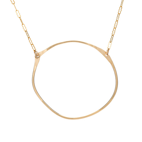 Freshie & Zero Apple necklace with a detailed pendant design on a delicate chain. Stylish jewelry accessory.